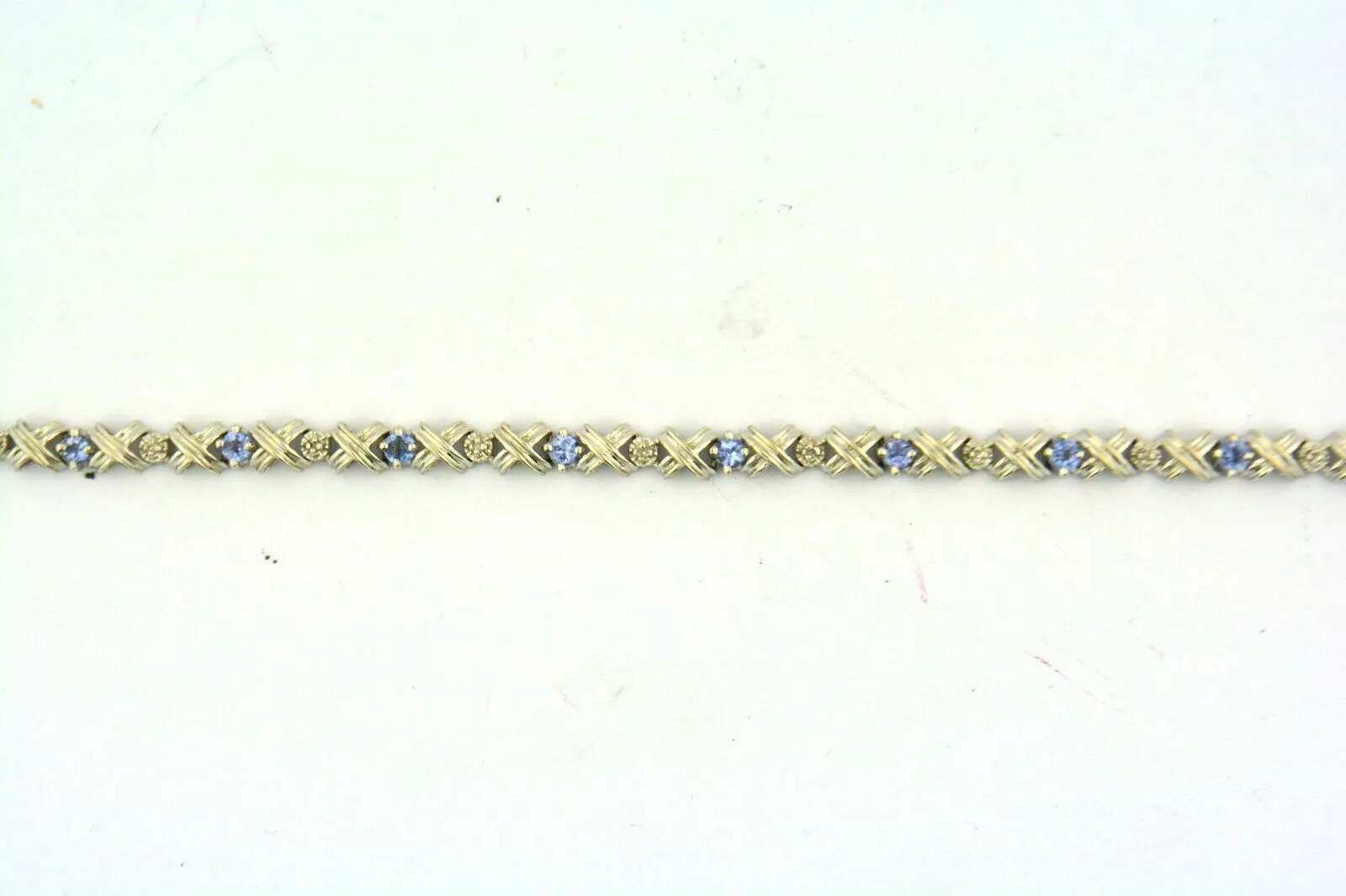 14KW 7.5IN 1CTTW Tanzanite and 5/8CTTW Diamond "X" Bracelet 7G