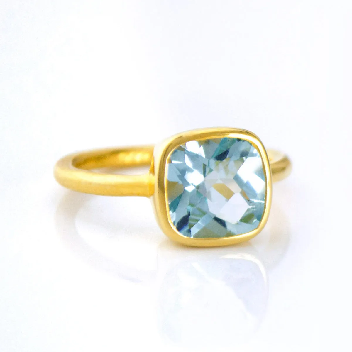 Blue Topaz Cushion Ring: December Birthstone