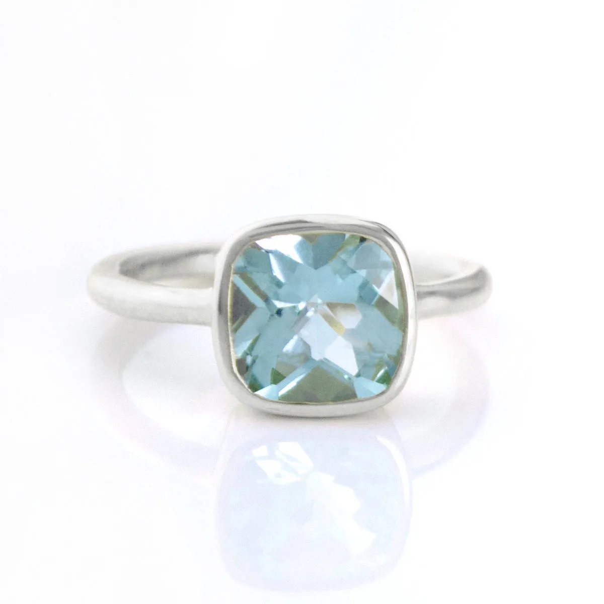 Blue Topaz Cushion Ring: December Birthstone