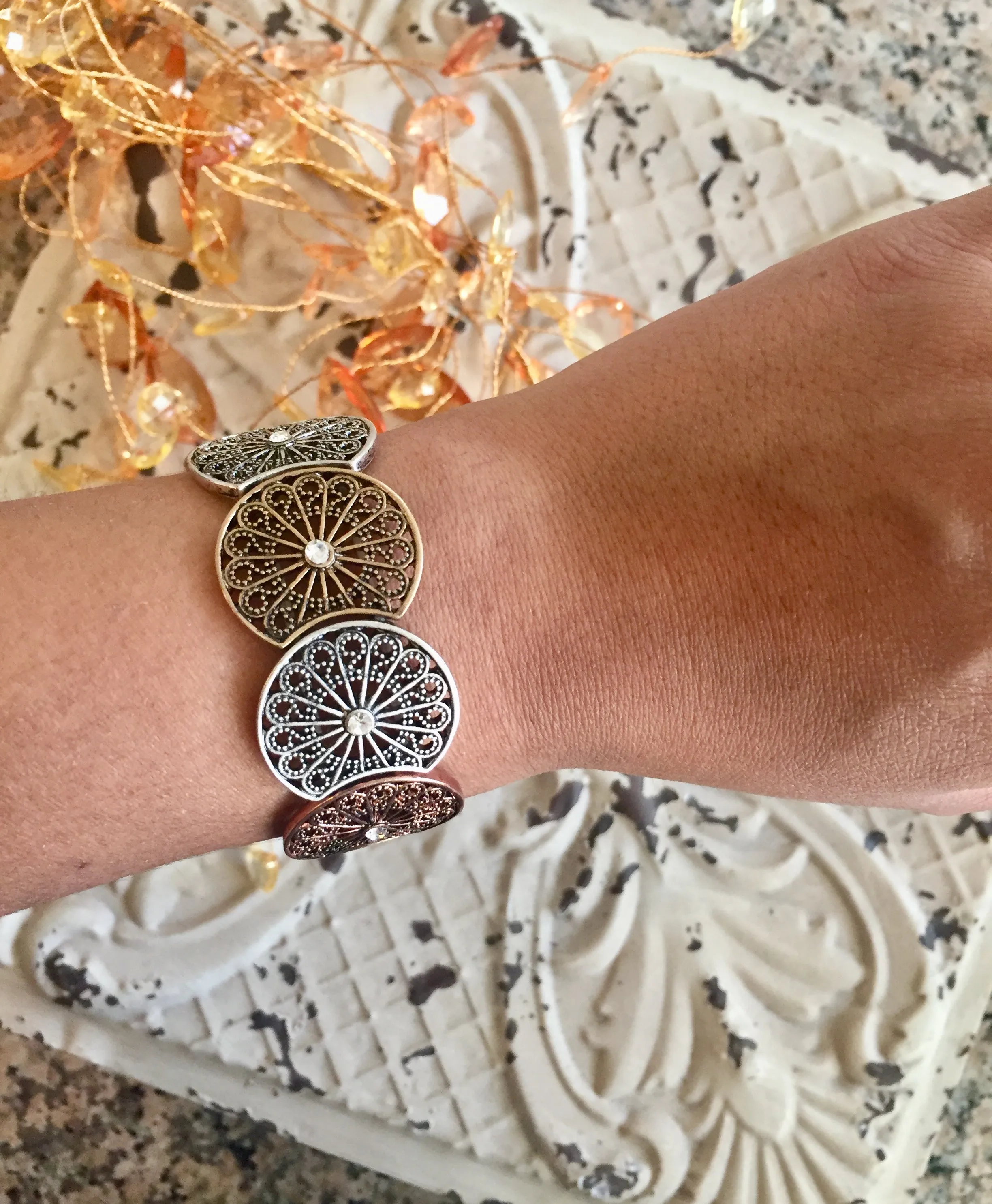 Desi Filigree Circular Patina Metal Bracelet